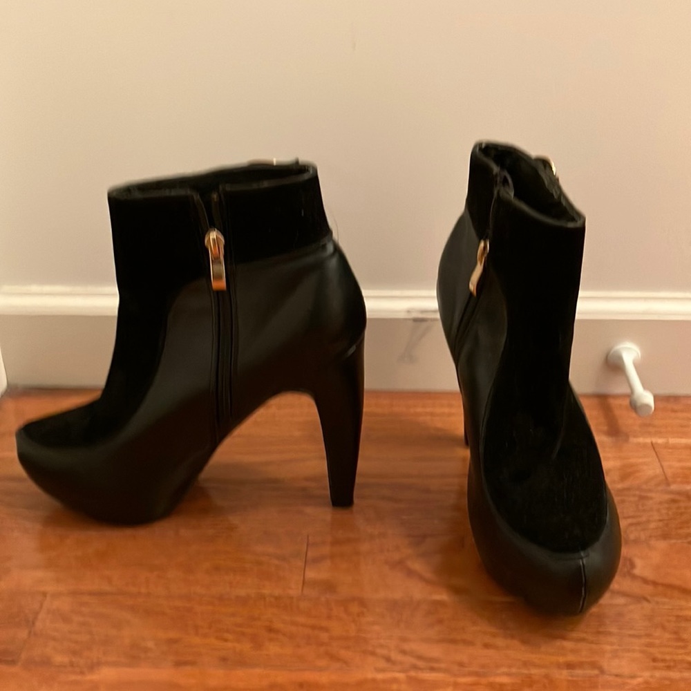 3-3 1/2 inch heel Black Leather and Suede Ankle Boots.